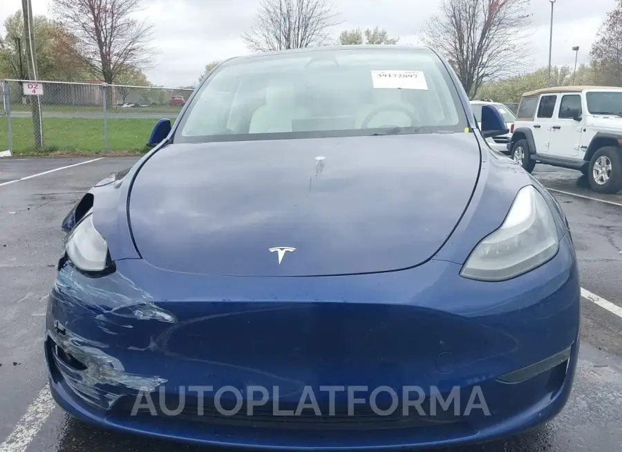 TESLA MODEL Y 2022 vin 7SAYGAEE8NF522413 from auto auction Iaai