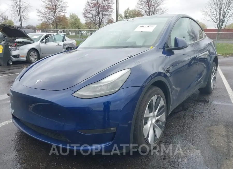 TESLA MODEL Y 2022 vin 7SAYGAEE8NF522413 from auto auction Iaai