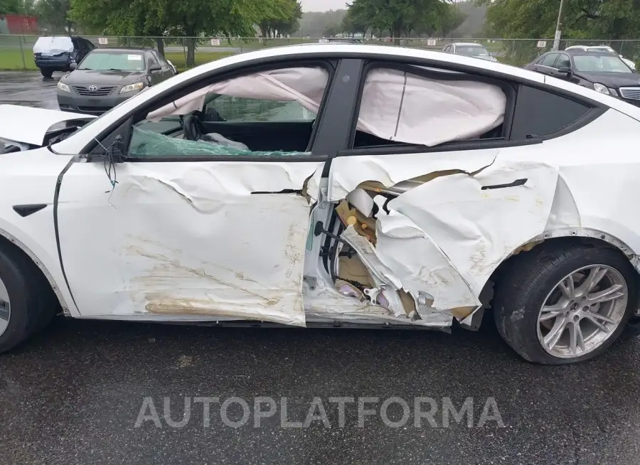 TESLA MODEL Y 2021 vin 5YJYGAEE3MF255466 from auto auction Iaai