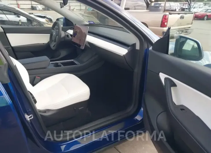 TESLA MODEL Y 2022 vin 7SAYGAEE9NF325833 from auto auction Iaai