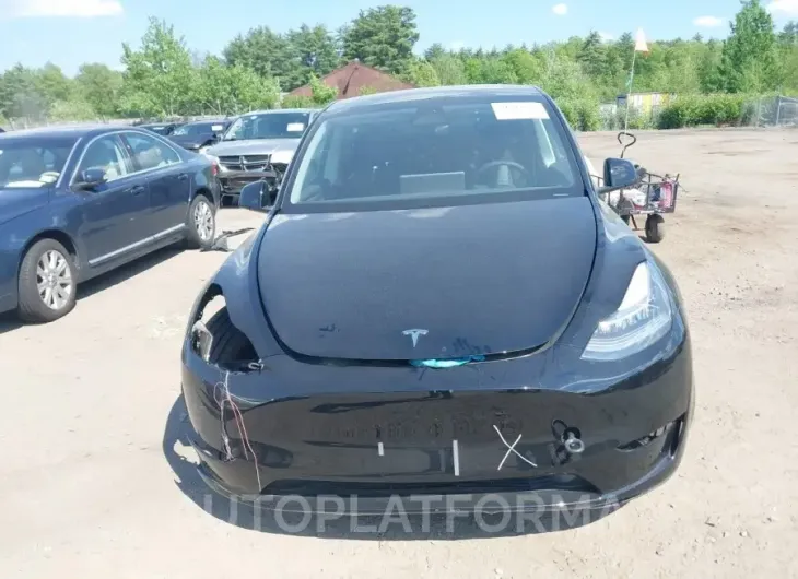 TESLA MODEL Y 2023 vin 7SAYGAEE0PF928768 from auto auction Iaai