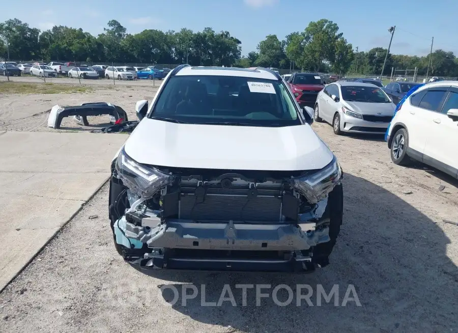 TOYOTA RAV4 HYBRID 2023 vin 4T3RWRFV1PU107299 from auto auction Iaai