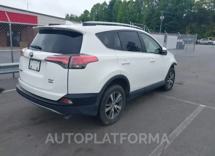 TOYOTA RAV4 2018 vin JTMRFREV6JJ726164 from auto auction Iaai