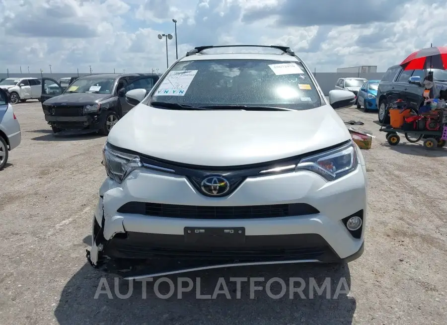 TOYOTA RAV4 2018 vin JTMYFREV4JJ745663 from auto auction Iaai