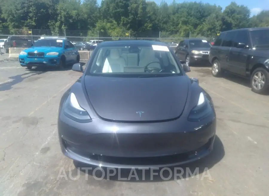 TESLA MODEL 3 2023 vin 5YJ3E1EC7PF712606 from auto auction Iaai