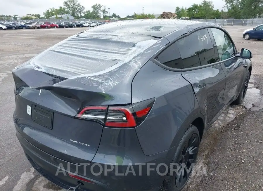 TESLA MODEL Y 2023 vin 7SAYGDEE2PF877629 from auto auction Iaai