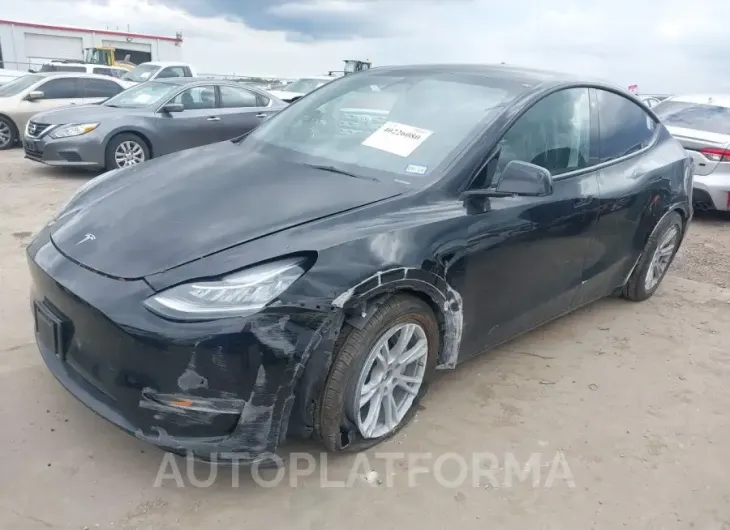 TESLA MODEL Y 2023 vin 7SAYGDEE4PA086077 from auto auction Iaai