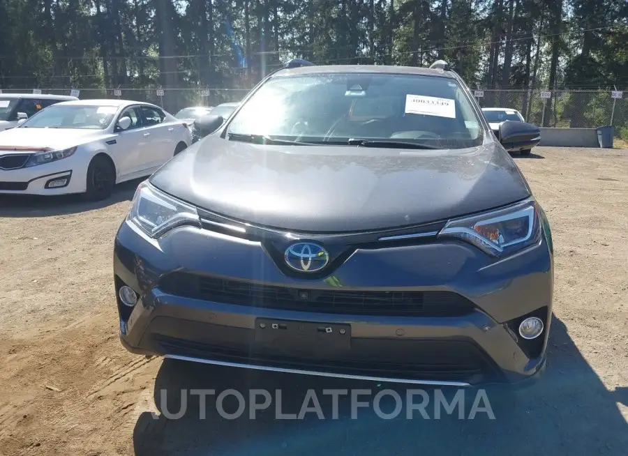 TOYOTA RAV4 HYBRID 2016 vin JTMDJREVXGD013087 from auto auction Iaai