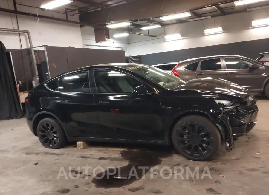 TESLA MODEL Y 2023 vin 7SAYGDEE0PA141429 from auto auction Iaai