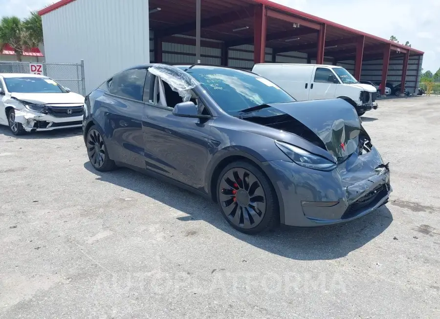 TESLA MODEL Y 2022 vin 7SAYGDEF2NF377699 from auto auction Iaai