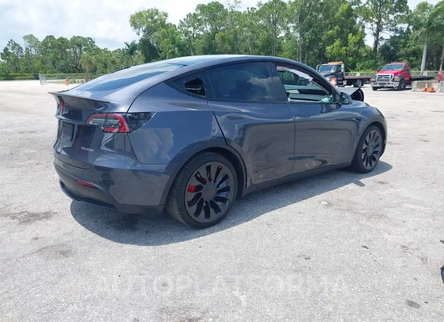 TESLA MODEL Y 2022 vin 7SAYGDEF2NF377699 from auto auction Iaai