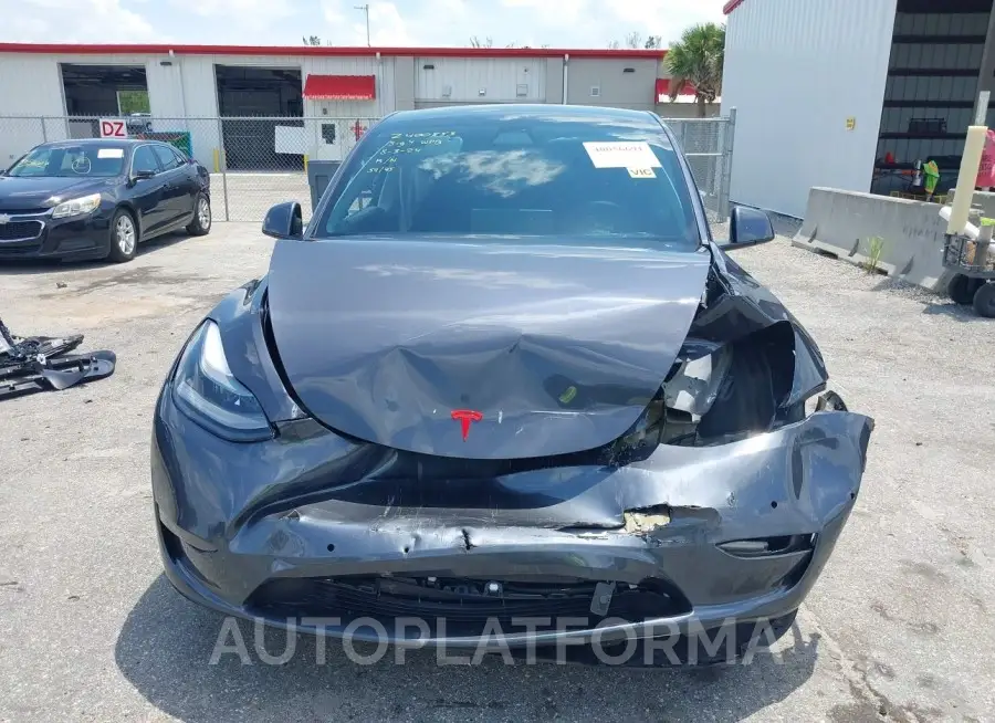 TESLA MODEL Y 2022 vin 7SAYGDEF2NF377699 from auto auction Iaai