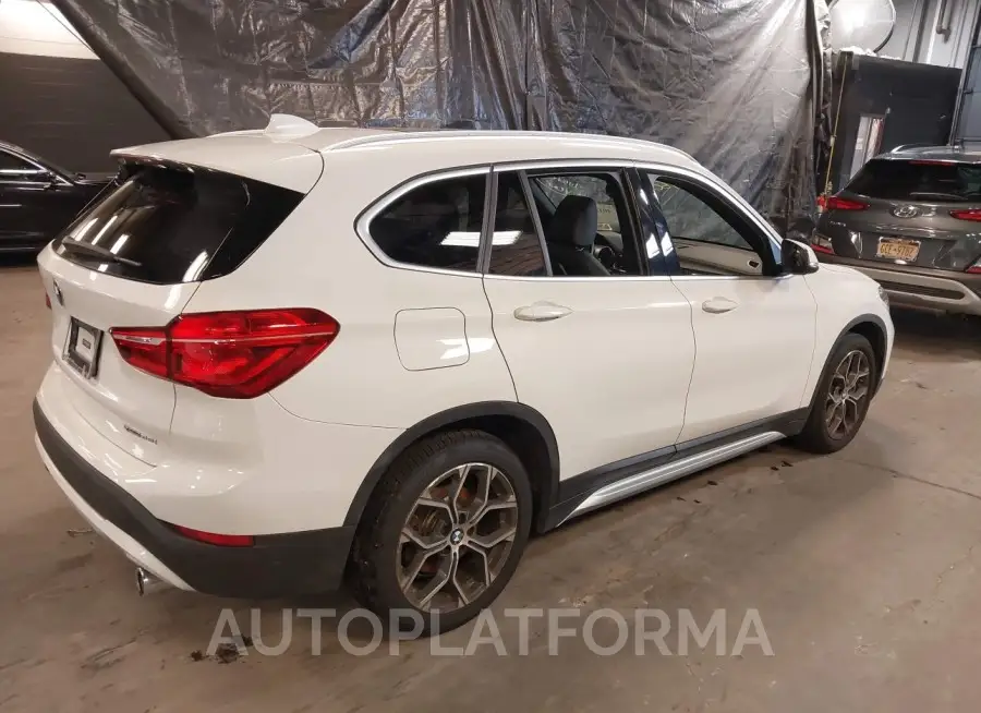 BMW X1 2021 vin WBXJG9C02M5T71558 from auto auction Iaai