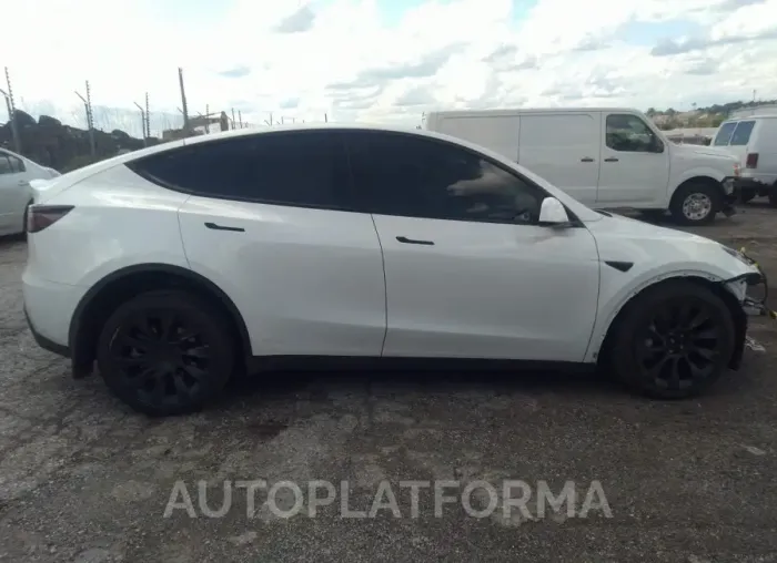 TESLA MODEL Y 2023 vin 7SAYGDEE1PF669192 from auto auction Iaai