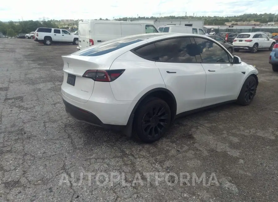 TESLA MODEL Y 2023 vin 7SAYGDEE1PF669192 from auto auction Iaai