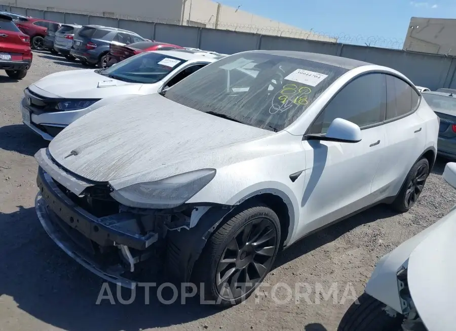 TESLA MODEL Y 2023 vin 7SAYGDEE9PA118747 from auto auction Iaai