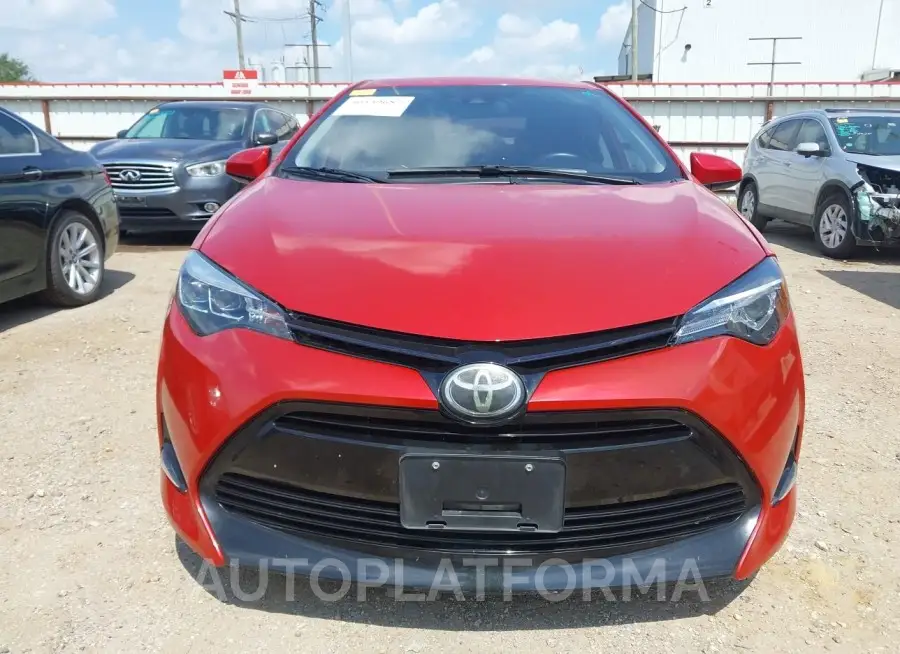 TOYOTA COROLLA 2018 vin 5YFBURHEXJP773633 from auto auction Iaai