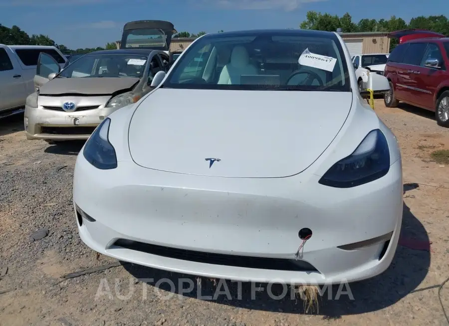 TESLA MODEL Y 2023 vin 7SAYGDEE9PF798846 from auto auction Iaai