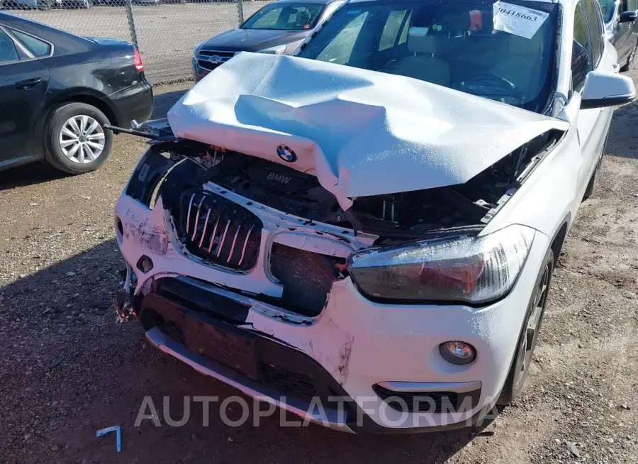 BMW X1 2018 vin WBXHT3C33J5F90173 from auto auction Iaai