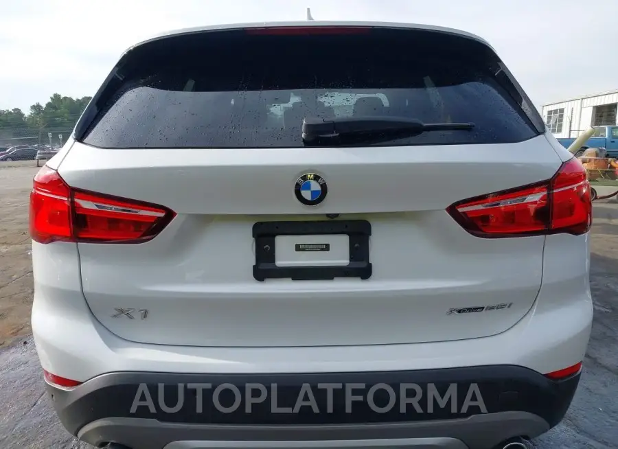 BMW X1 2019 vin WBXHT3C57K5N36343 from auto auction Iaai