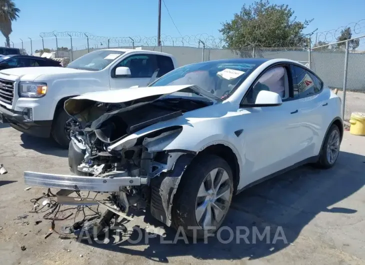 TESLA MODEL Y 2023 vin 7SAYGDEE1PF628111 from auto auction Iaai