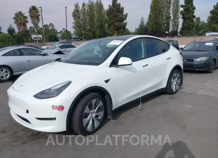 TESLA MODEL Y 2023 vin 7SAYGAEE8PF812623 from auto auction Iaai