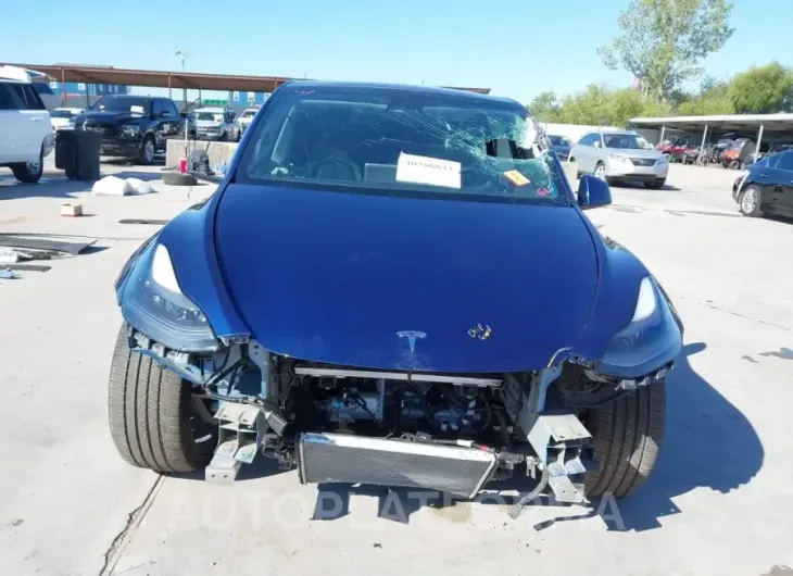 TESLA MODEL Y 2022 vin 7SAYGDEF2NF374852 from auto auction Iaai