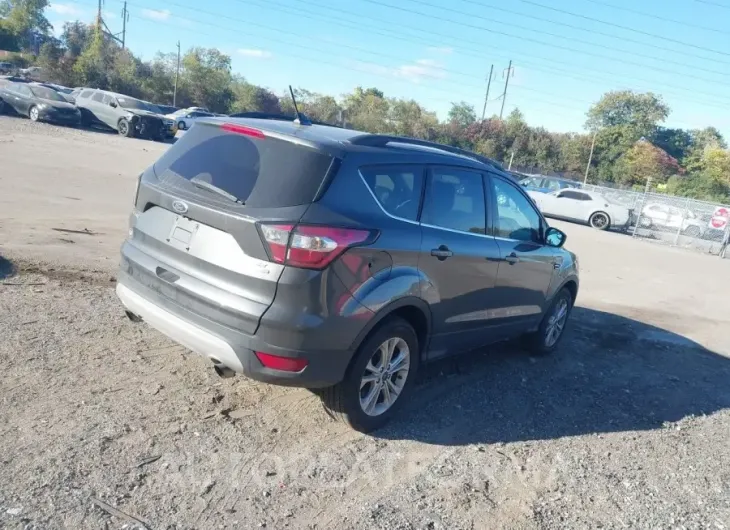 FORD ESCAPE 2018 vin 1FMCU9GD8JUA60130 from auto auction Iaai