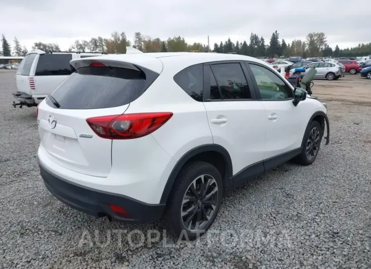 MAZDA CX-5 2016 vin JM3KE4DY0G0876022 from auto auction Iaai