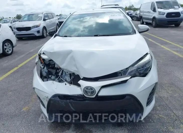 TOYOTA COROLLA 2019 vin 5YFBURHEXKP880506 from auto auction Iaai