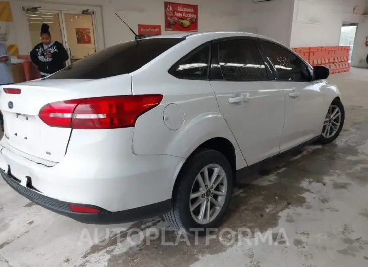 FORD FOCUS 2016 vin 1FADP3F27GL381447 from auto auction Iaai