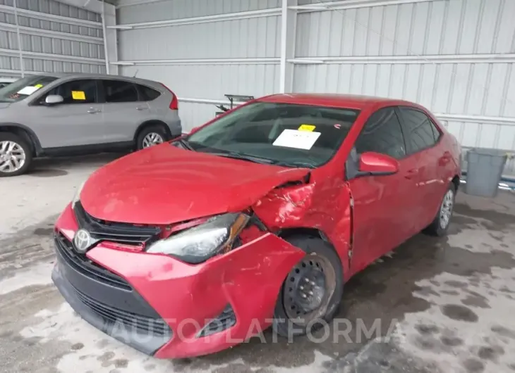 TOYOTA COROLLA 2018 vin 5YFBURHE5JP749031 from auto auction Iaai