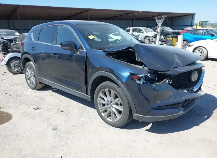 MAZDA CX-5 2021 vin JM3KFADM1M1321420 from auto auction Iaai