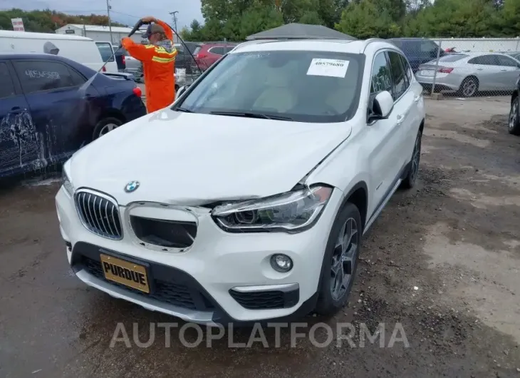 BMW X1 2016 vin WBXHT3C3XG5E48220 from auto auction Iaai